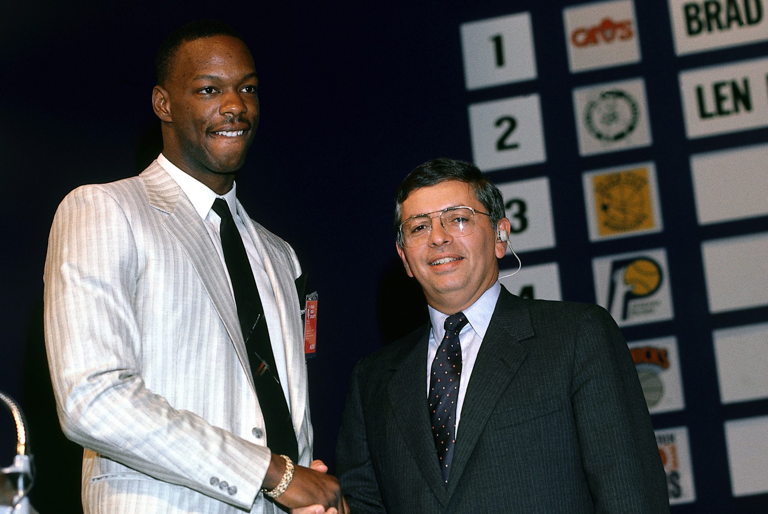 Len Bias shakes hands with David Stern